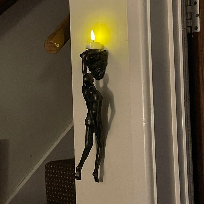 Klimwand hangende beelden