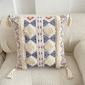 Maroccan-inspired decorative throw pillow with tassels